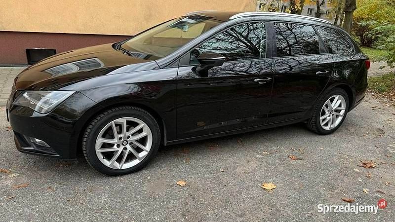 Czarny Używany 2015 Seat Leon Kombi | 39 900 zł (Uczciwa cena) - Obraz 1/4