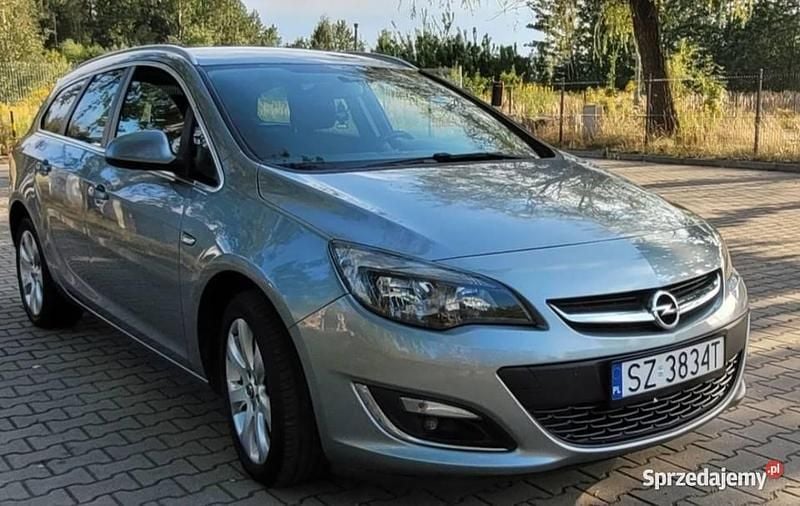 Szary Używany 2013 Opel Astra Kombi | 26 800 zł (Uczciwa cena) - Obraz 1/4