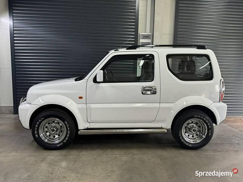 Biały Używany 2009 Suzuki Jimny SUV | 47 700 zł (Drogi) - Obraz 1/4