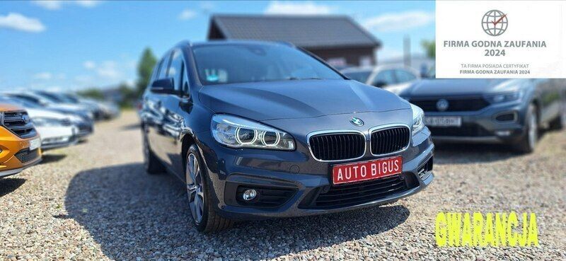 Szary (metalik) Używany 2015 BMW 218 Minivan | 44 900 zł (Drogi) - Obraz 1/4