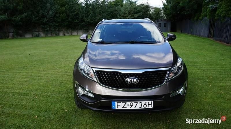 Brązowy Używany 2014 Kia Sportage 2 SUV | 44 999 zł (Uczciwa cena) - Obraz 1/4