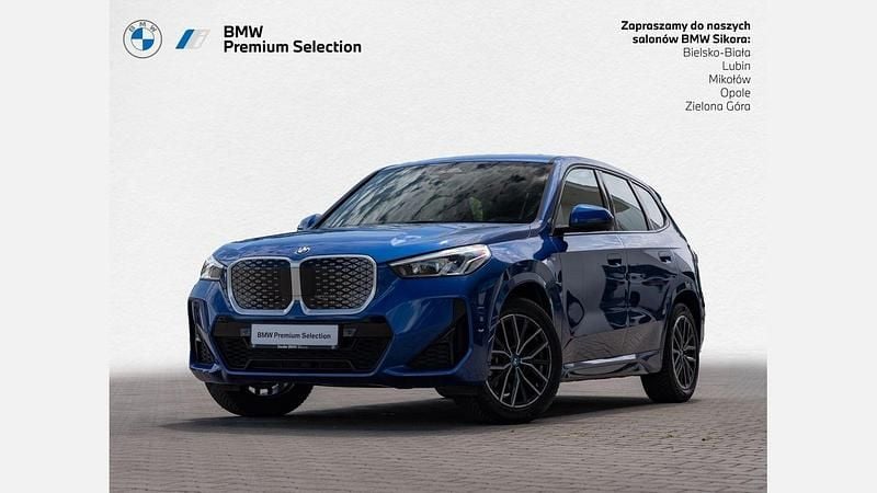 Niebieski portimao m metalizowany Używany 2024 BMW iX1 Luxury Line SUV | 179 900 zł - Obraz 1/3