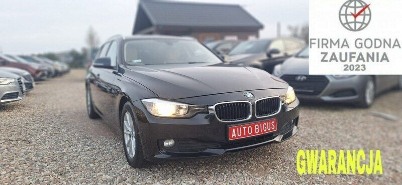 Czarny Używany 2012 BMW 320 Kombi | 35 900 zł - Obraz 1/4