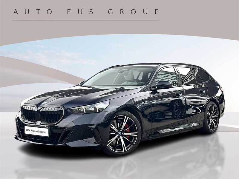Czarny carbon m metalizowany Używany 2024 BMW 530e Comfort Edition Kombi | 335 900 zł (Drogi) - Obraz 1/3