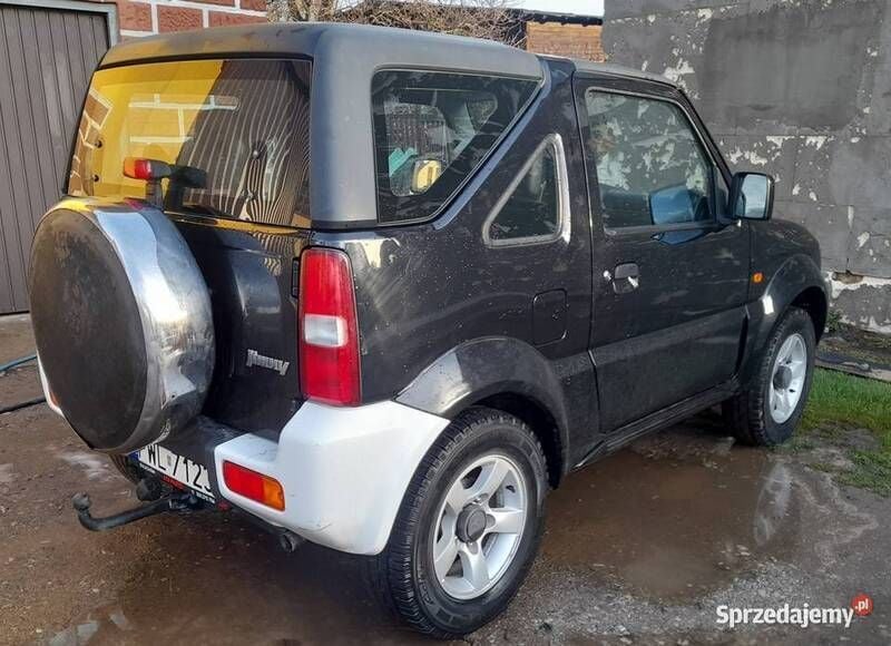 Czarny Używany 2009 Suzuki Jimny SUV | 25 500 zł (Super Cena) - Obraz 1/4