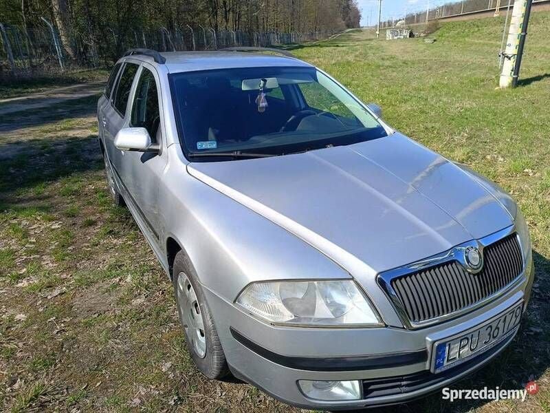 Srebrny Używany 2007 Skoda Octavia Kombi | 9200 zł (Uczciwa cena) - Obraz 1/4