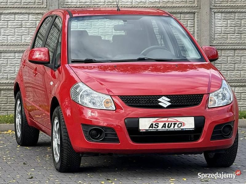 Czerwony Używany 2010 Suzuki SX4 Hatchback | 23 700 zł (Drogi) - Obraz 1/4