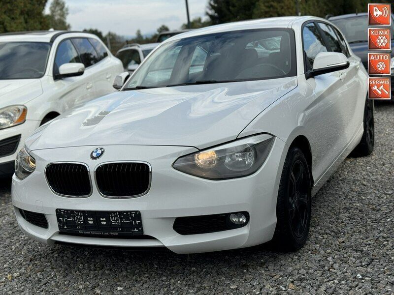 Biały Używany 2013 BMW 114 Hatchback | 28 900 zł - Obraz 1/4
