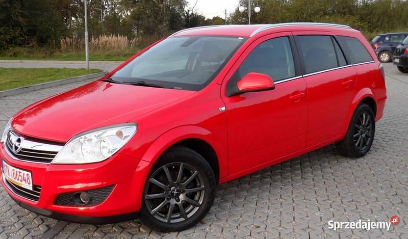 Czerwony Używany 2009 Opel Astra Kombi | 13 800 zł (Dość drogi) - Obraz 1/4