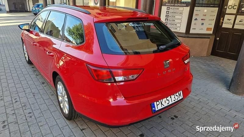 Czerwony Używany 2014 Seat Leon Kombi | 27 500 zł (Uczciwa cena) - Obraz 1/4