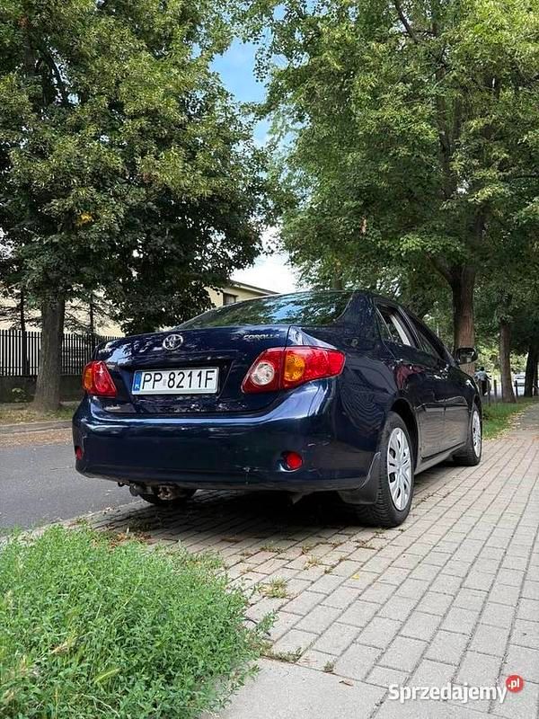Używany Toyota Corolla 124 KM (91 kW) 2007 Granatowy Sedan/Limuzyna