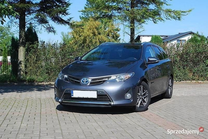 Szary (metalik) Używany 2014 Toyota Auris Hybrid Kombi | 48 500 zł (Uczciwa cena) - Obraz 1/4