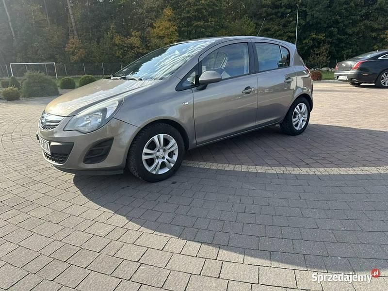 Używany Opel Corsa 90 KM (66 kW) 2012 Brązowy Hatchback