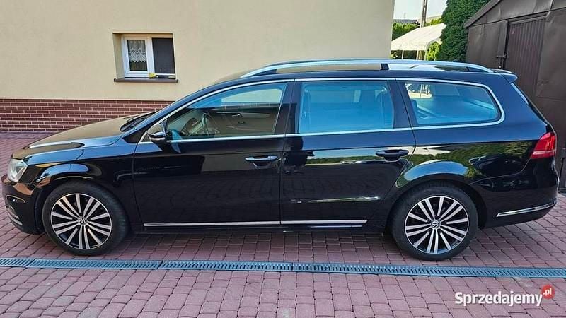 Czarny Używany 2014 VW Passat Kombi | 42 500 zł (Uczciwa cena) - Obraz 1/4