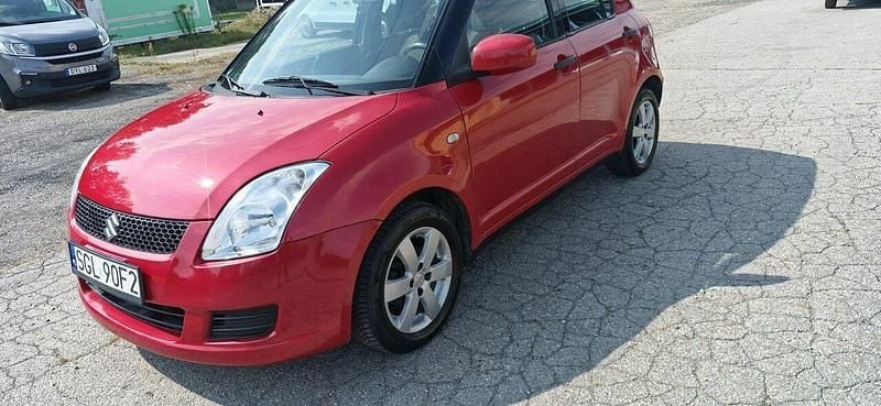 Czerwony Używany 2009 Suzuki Swift Hatchback | 9900 zł - Obraz 1/4