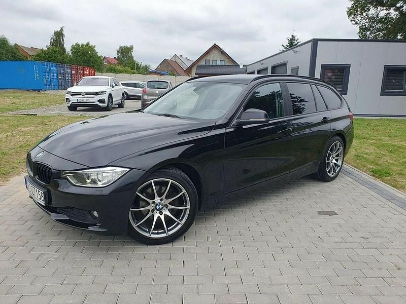 Czarny Używany 2014 BMW 320 Sport Line Kombi | 45 500 zł - Obraz 1/4