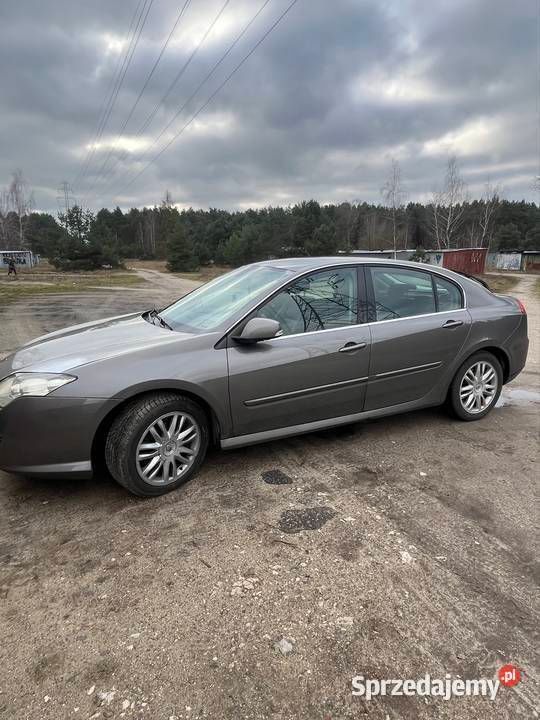 Szary Używany 2009 Renault Laguna III Hatchback | 11 900 zł (Uczciwa cena) - Obraz 1/4