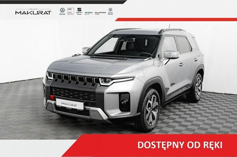 Szary Używany 2023 Ssangyong Torres SUV | 119 810 zł - Obraz 1/4