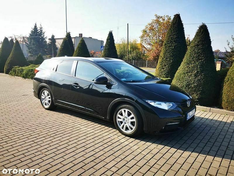 Używany Honda Civic Elegance 120 KM (88 kW) 2014 Czarny Kombi