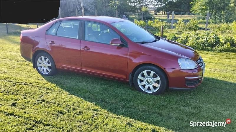 Czerwony Używany 2006 VW Jetta Sedan/Limuzyna | 11 600 zł (Drogi) - Obraz 1/3