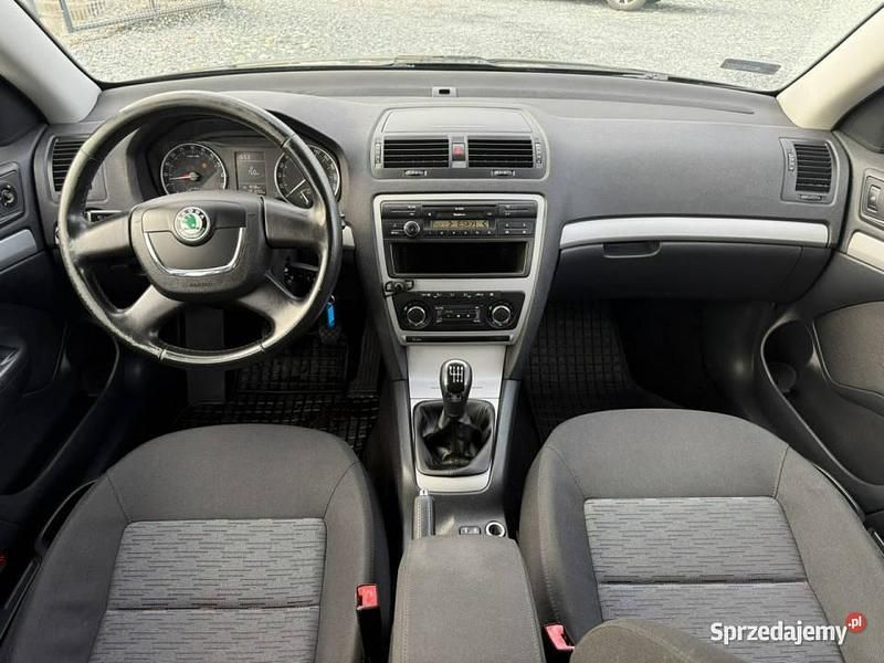 Używany Skoda Octavia 110 KM (80 kW) 2013 Czarny Kombi