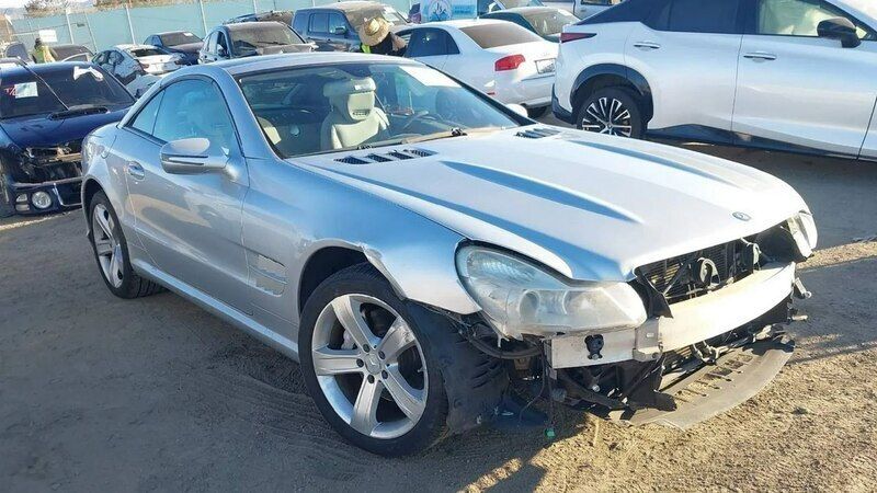 Srebrny (metalik) Używany 2012 Mercedes SL400 Coupe | 48 500 zł - Obraz 1/4