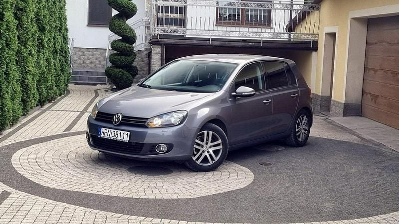 Szary (metalik) Używany 2011 VW Golf VI Hatchback | 26 900 zł (Uczciwa cena) - Obraz 1/4