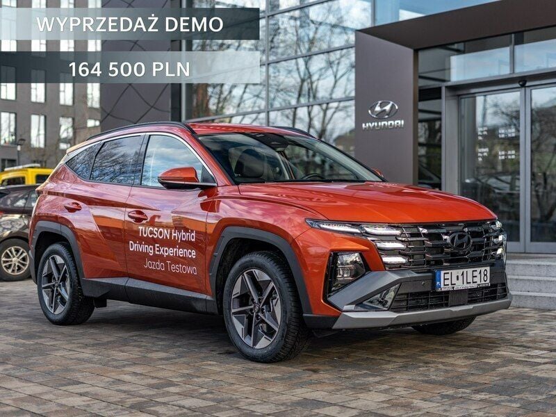 Pomarańczowy (metalik) Używany 2024 Hyundai Tucson SUV | 164 500 zł (Drogi) - Obraz 1/4