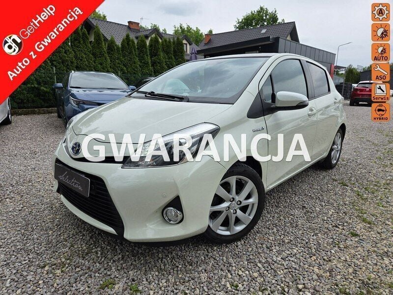 Biały Używany 2013 Toyota Yaris Hybrid Hatchback | 32 900 zł (Dobra cena) - Obraz 1/4