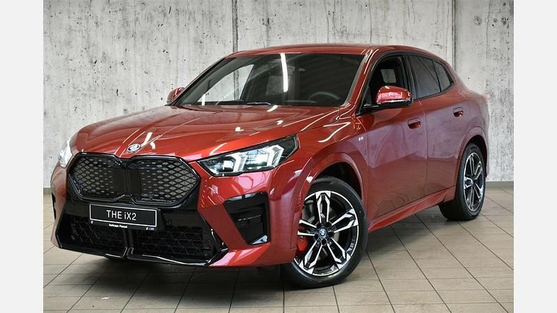 Czerwony fire red metalizowany Używany 2024 BMW iX2 Comfort Edition SUV | 209 900 zł - Obraz 1/3
