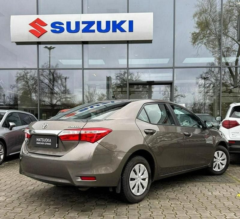 Używany Toyota Corolla 132 KM (97 kW) 2018 Brązowy (metalik) Sedan/Limuzyna