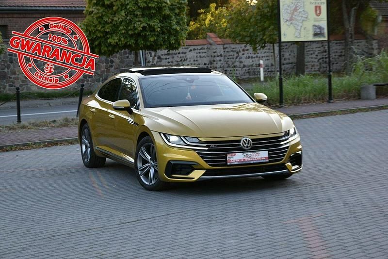 Żółtozłoty Używany 2019 VW Arteon R-line Sedan/Limuzyna | 104 800 zł (Uczciwa cena) - Obraz 1/4