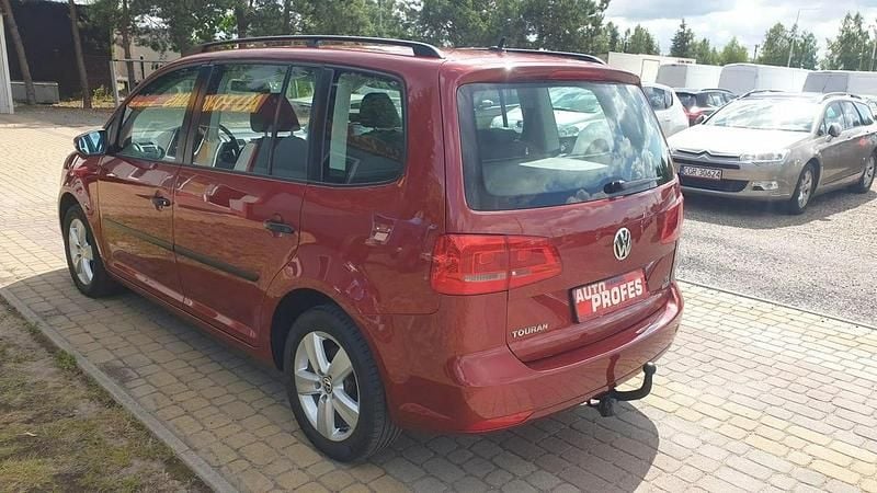 Używany VW Touran 105 KM (77 kW) 2010 Bordowy (metalik) Minivan
