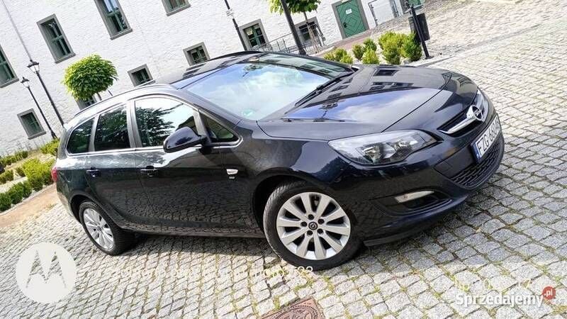 Brązowy Używany 2014 Opel Astra Kombi | 23 500 zł (Uczciwa cena) - Obraz 1/4