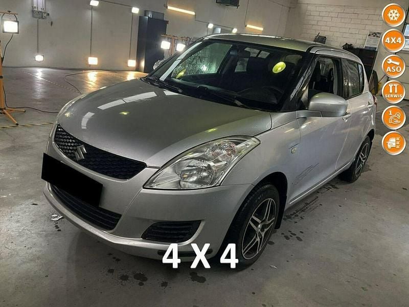 Srebrny Używany 2013 Suzuki Swift Hatchback | 24 999 zł (Uczciwa cena) - Obraz 1/4