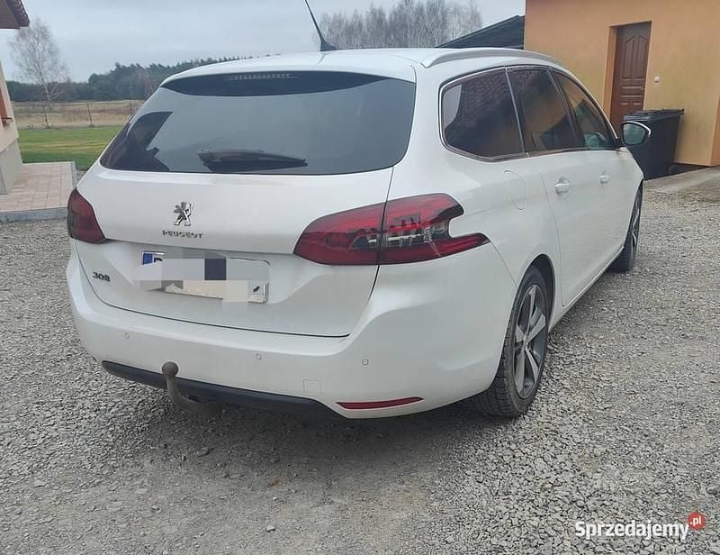 Biały Używany 2014 Peugeot 308 Kombi | 30 000 zł (Uczciwa cena) - Obraz 1/4
