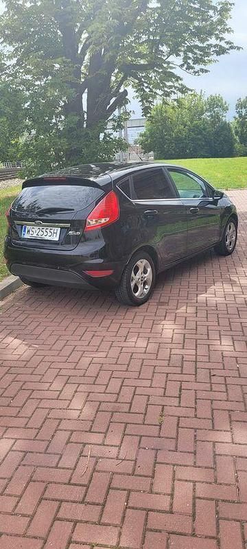 Używany Ford Fiesta Titanium 97 KM (71 kW) 2010 Czarny Hatchback
