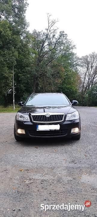 Czarny Używany 2009 Skoda Octavia Kombi | 15 000 zł (Uczciwa cena) - Obraz 1/4