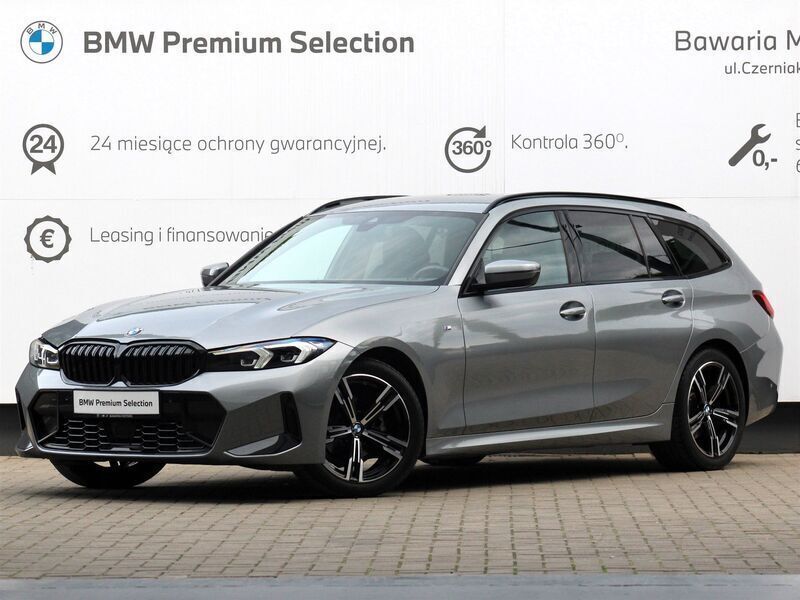Szary skyscraper m metalizowany Używany 2023 BMW 318 Comfort Edition Kombi | 184 900 zł - Obraz 1/3