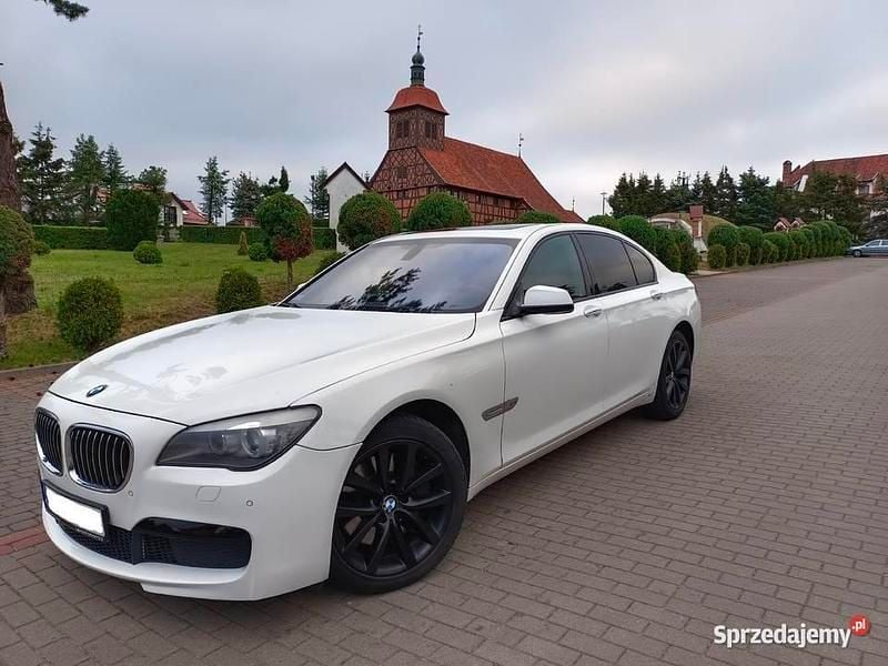 Biały Używany 2012 BMW 740 Sedan/Limuzyna | 64 999 zł - Obraz 1/4