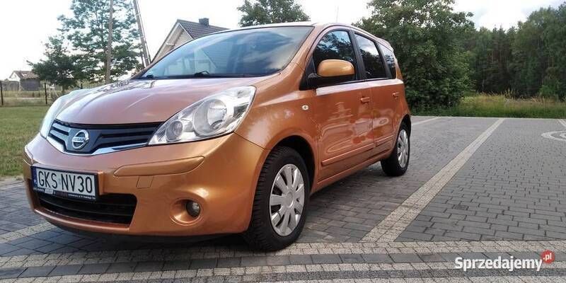 Pomarańczowy Używany 2010 Nissan Note Minivan | 17 600 zł (Uczciwa cena) - Obraz 1/4