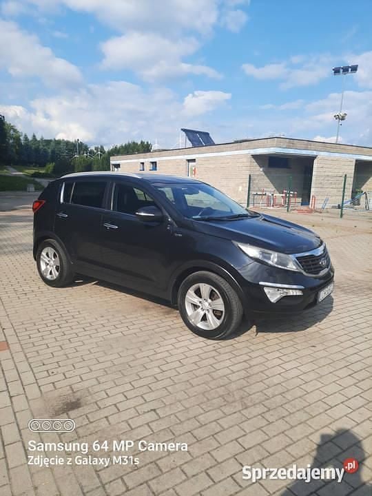 Czarny Używany 2013 Kia Sportage SUV | 34 900 zł (Uczciwa cena) - Obraz 1/4