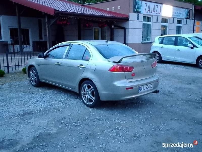 Używany Mitsubishi Lancer 109 KM (80 kW) 2010 Zielony Sedan/Limuzyna