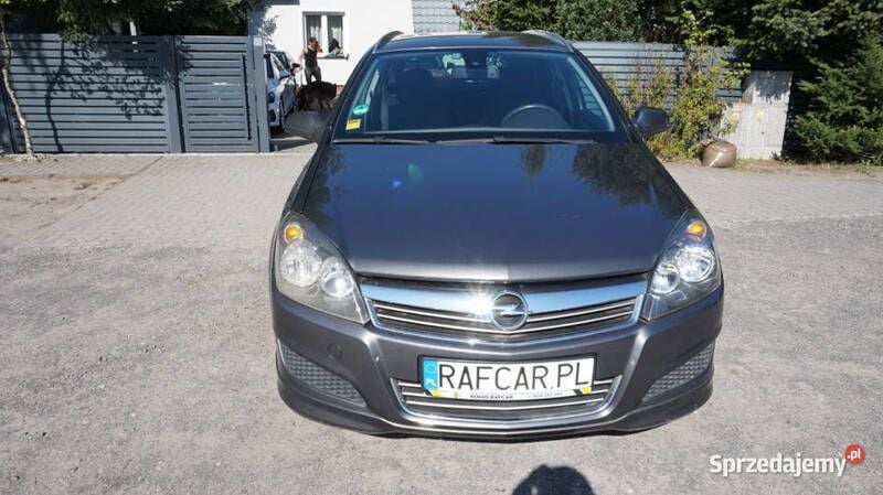 Szary Używany 2010 Opel Astra Kombi | 14 999 zł (Uczciwa cena) - Obraz 1/4