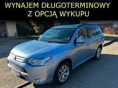 Niebieski Używany 2013 Mitsubishi Outlander P-HEV SUV | 1000 zł - Obraz 1/4