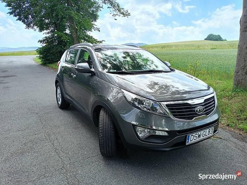 Szary Używany 2012 Kia Sportage SUV | 34 500 zł (Uczciwa cena) - Obraz 1/4