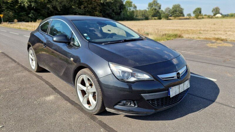 Czarny Używany 2012 Opel Astra Coupe | 14 999 zł - Obraz 1/4