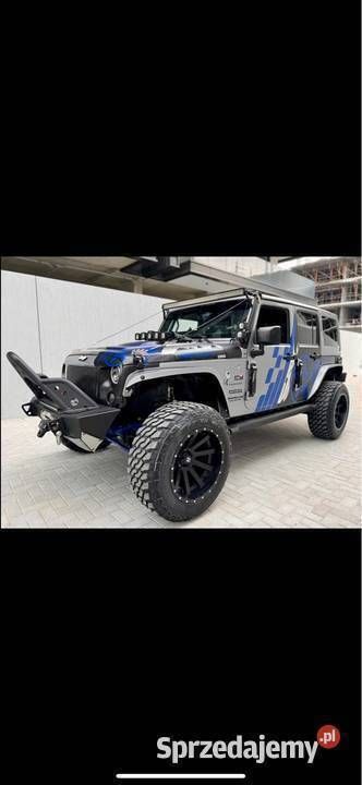 Srebrny Używany 2015 Jeep Wrangler Unlimited SUV | 169 000 zł - Obraz 1/4