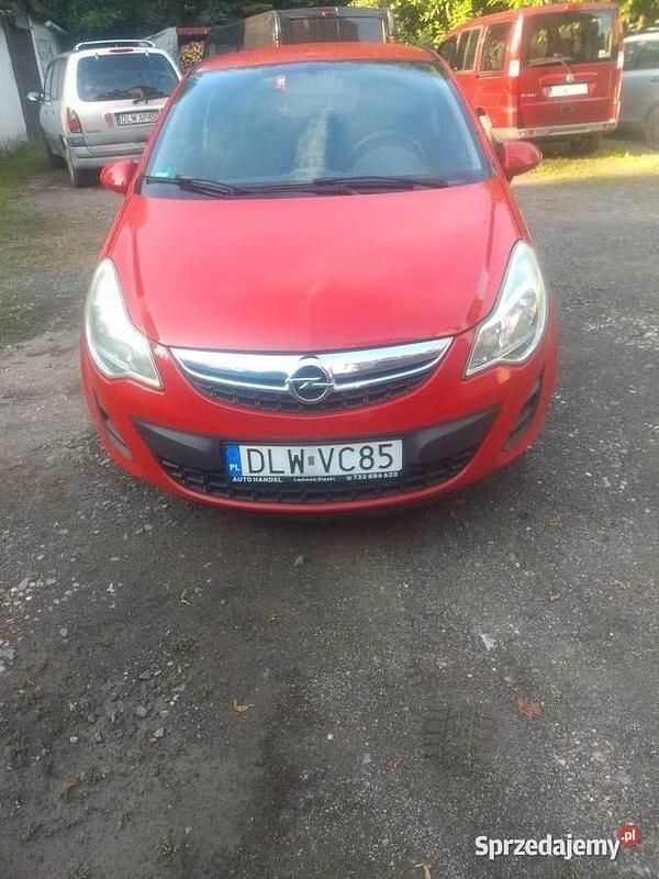 Czerwony Używany 2013 Opel Corsa Hatchback | 13 500 zł (Super Cena) - Obraz 1/4