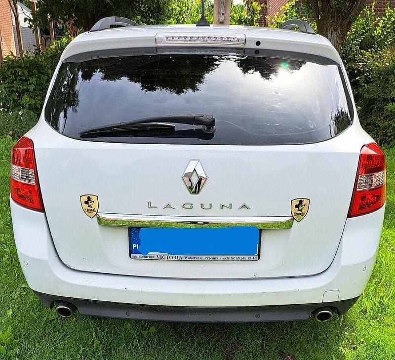 Biały Używany 2009 Renault Laguna III Kombi | 9000 zł (Uczciwa cena) - Obraz 1/4